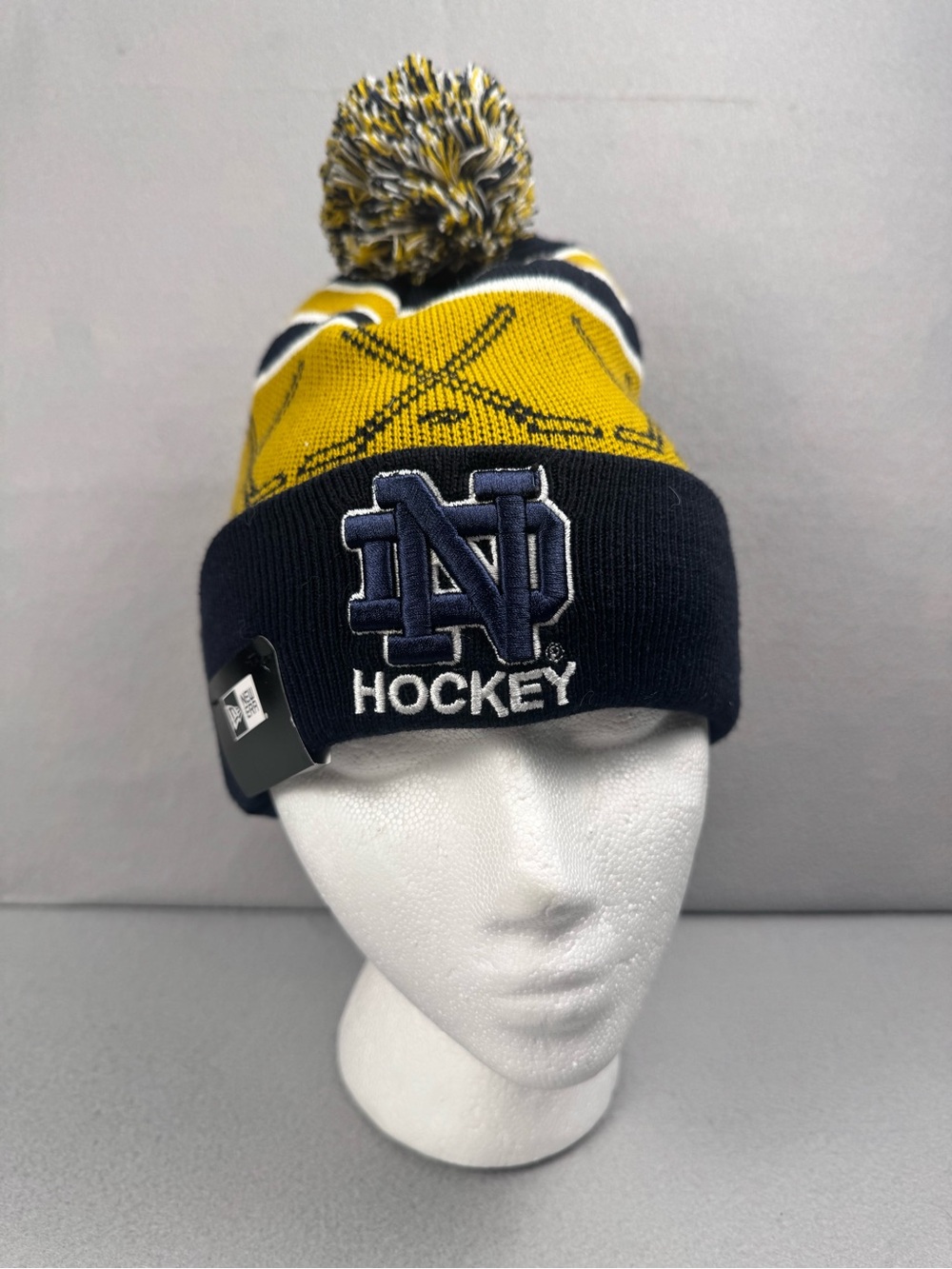 New Era Navy and Yellow Notre Dame Hockey Pom Beanie